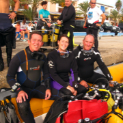 Three divers in a rhib