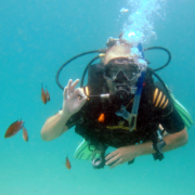 Happy diver with fish