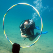 Diver going through hoop at Cabo de Palos