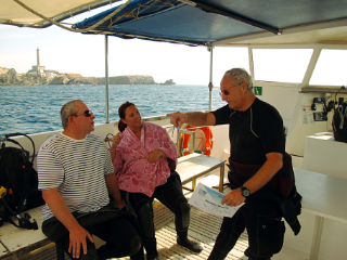 Divers take instruction on the boat in Cabo de Palos